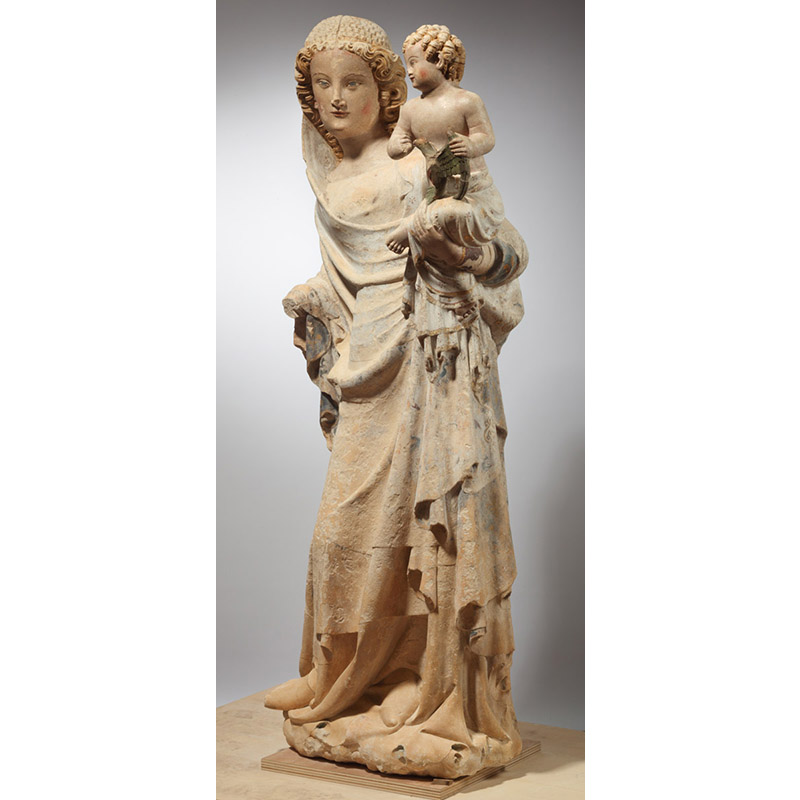 Statue en pierre calcaire, polychrome, représentant une Vierge à l'Enfant.