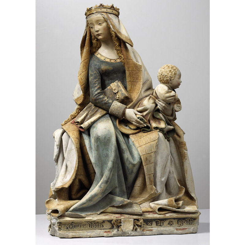 Sculpture en pierre, polychrome représentant une Vierge à l'Enfant.